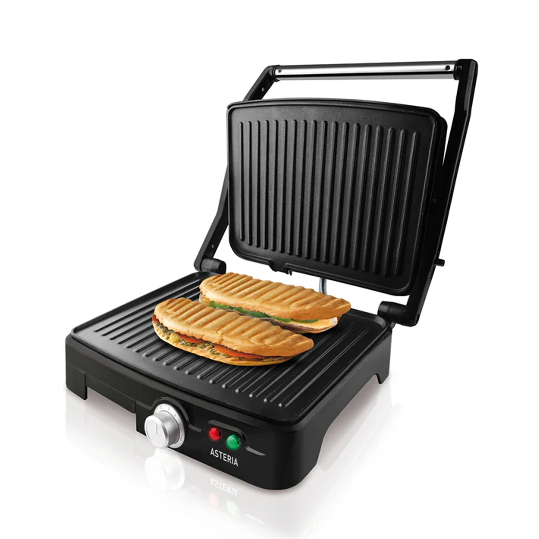 Imagen del grill doble Asteria de Taurus en uso, mostrando su capacidad para cocinar alimentos de manera uniforme y eficiente a 180 grados, disponible en Electrocash