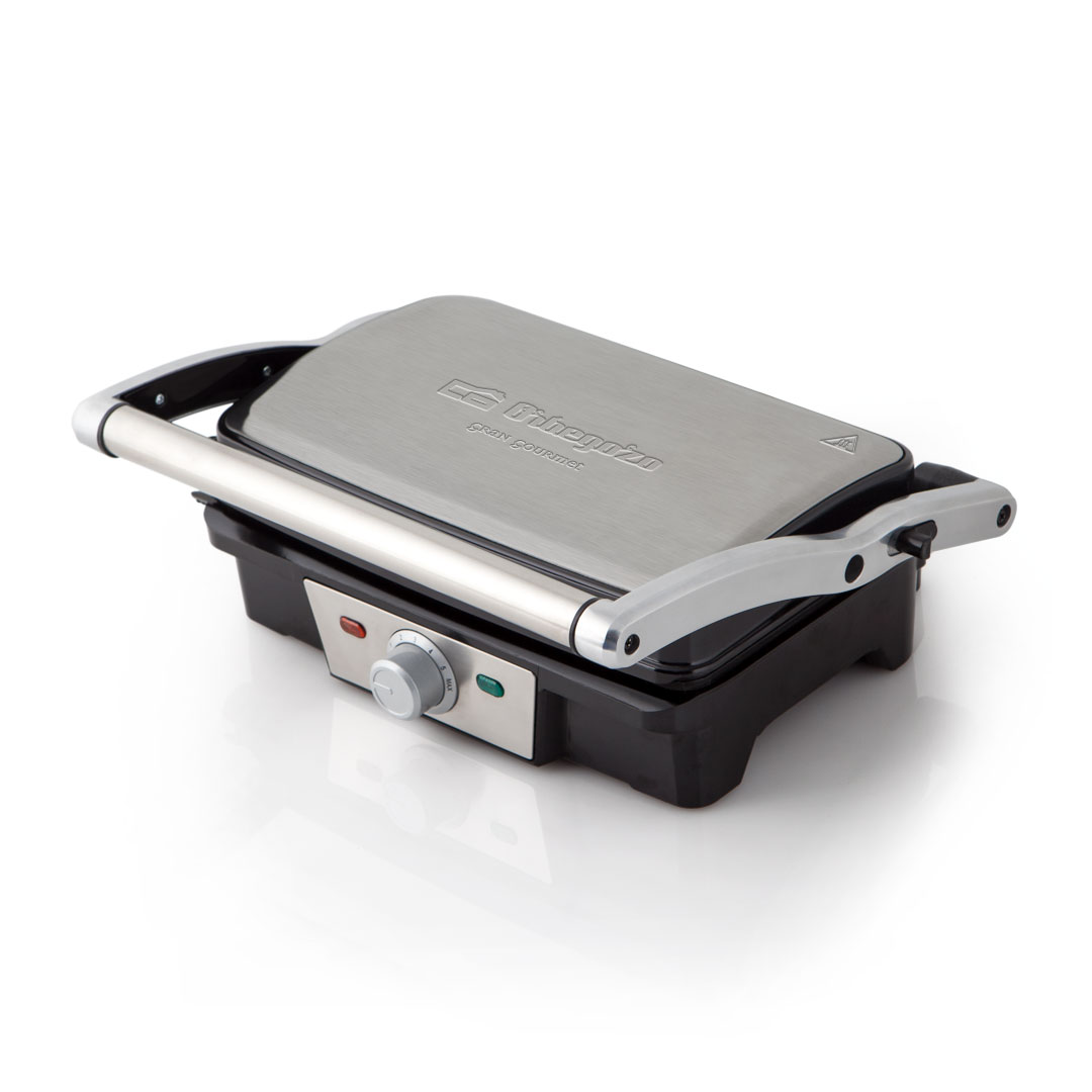 Imagen principal del grill GR-3800 de Orbegozo, con una potencia de 1500W y acabado en acero inoxidable, ideal para cocinar alimentos de manera uniforme a 180 grados, disponible en Electrocash