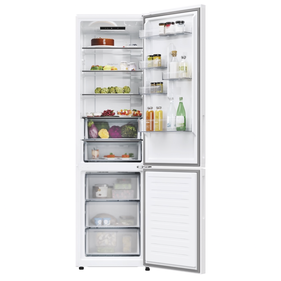 Frigorífico combi Candy CNCQ-2T620EW en color blanco, mostrando su interior lleno de alimentos. Disponible en Electrocash