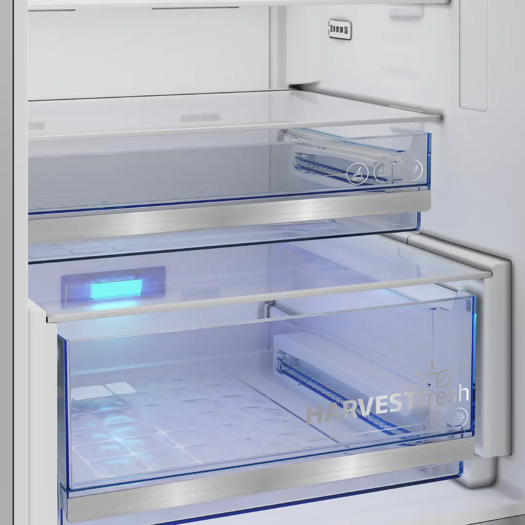 Detalle del cajón HarvestFresh del frigorífico Beko B5RCNE-416HXB diseñado para mantener frutas y verduras frescas por más tiempo con tecnología de luz especial.