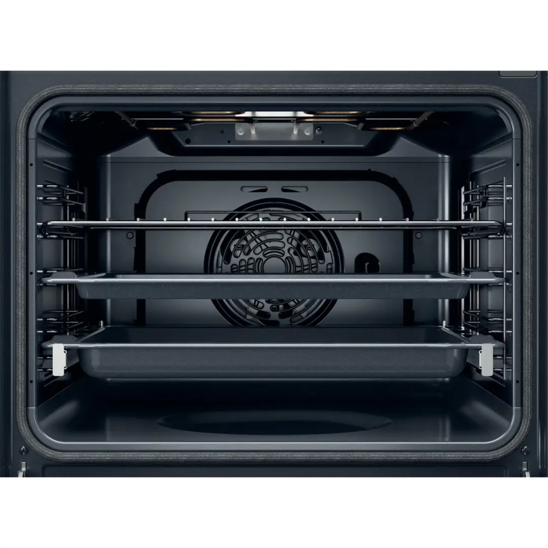 Imagen del horno Whirlpool OMSR-58RU1SX abierto, mostrando su interior de 71 L con bandejas, parrilla y sistema de limpieza pirolítica e hidrolítica, disponible en Electrocash.