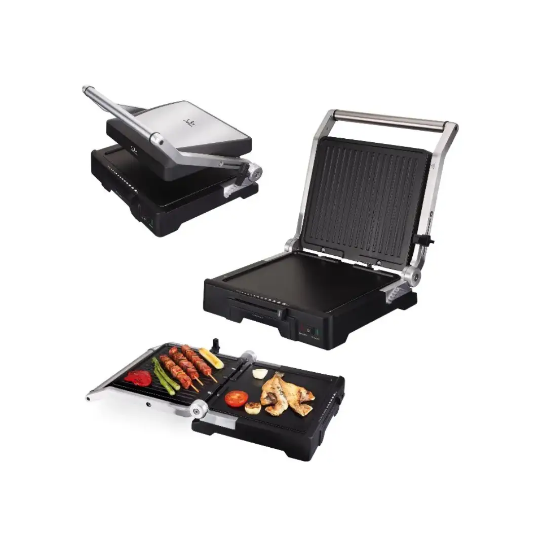 Grill JATA GR-1100 abierto y en funcionamiento, mostrando su amplia superficie de cocinado y resistencia de 2000W, ideal para preparar carnes y verduras. Imagen demostrando su uso real.