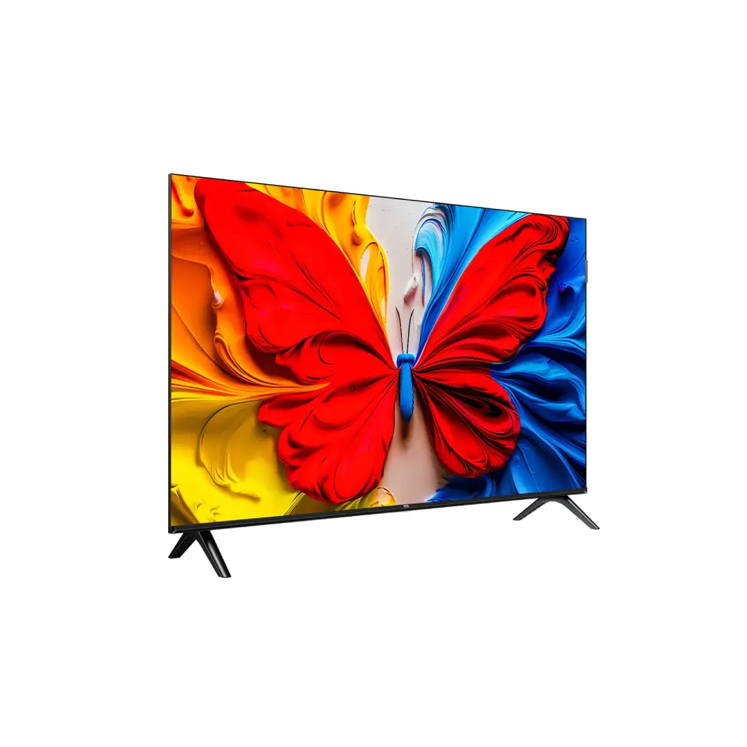 Vista lateral del televisor TCL 40S5K QLED de 40 pulgadas, mostrando su perfil delgado, biseles reducidos y soporte estable en acabado negro — disponible en Electrocash.