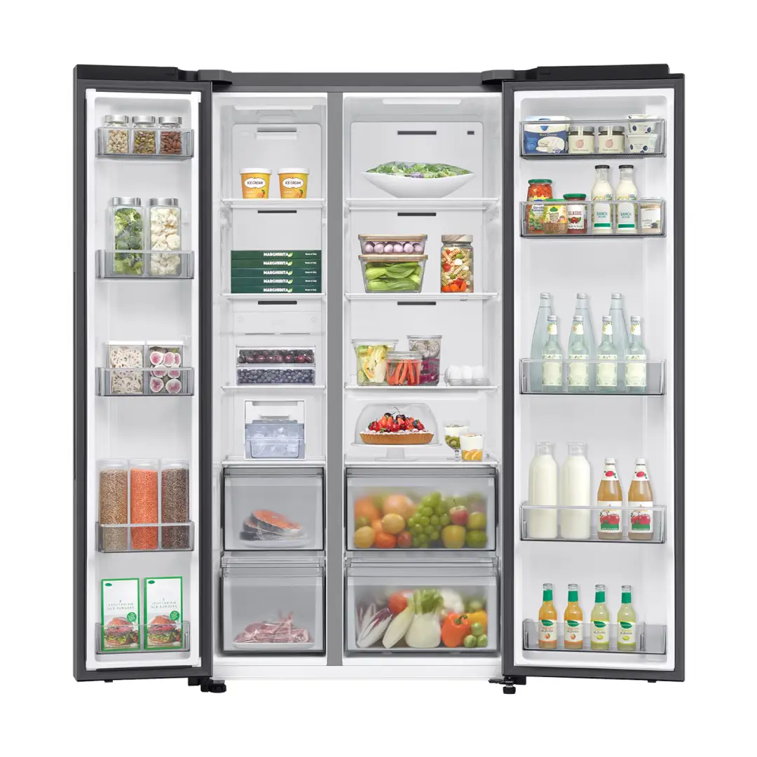 Interior del frigorífico americano Samsung RS-70F65QETEF mostrando sus amplios compartimentos, estantes de cristal templado y cajones de gran capacidad llenos de alimentos, disponible en Electrocash.