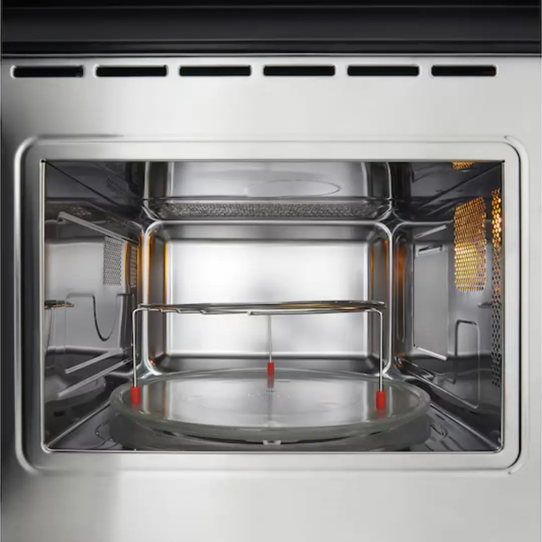 Imagen de detalle del interior del microondas LG MG-7Z2593D, mostrando la resistencia grill superior para gratinar alimentos.
