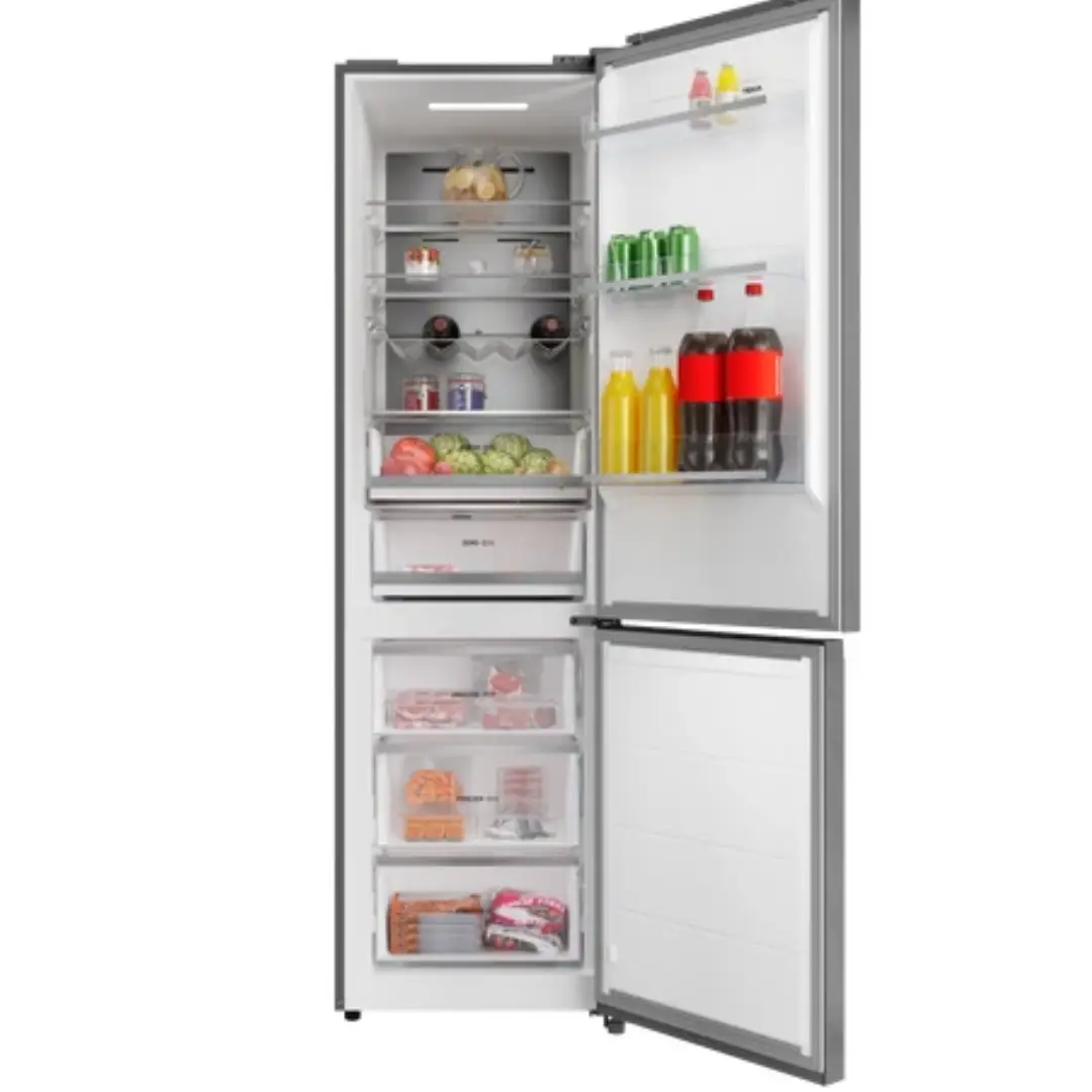 Imagen del frigorífico Teka RBF-88680 abierto y lleno de alimentos, mostrando estantes de cristal, cajones y congelador inferior con sistema Total No Frost.