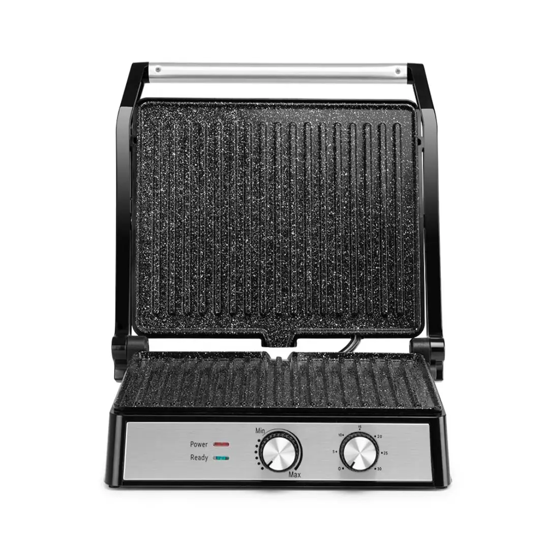 Imagen del grill Orbegozo GR-4580 abierto a 180 grados, mostrando sus dos placas de cocción para usar como plancha amplia y cocinar varios alimentos a la vez.